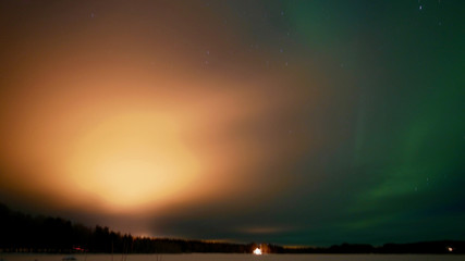 Fototapeta na wymiar Aurora Borealis / Northern Light in the sky of Lapland, Finland