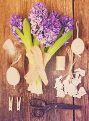 Blue hyacinth flowers and easter set up, retro toned
