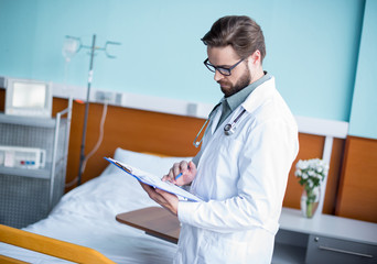 Male doctor with clipboard