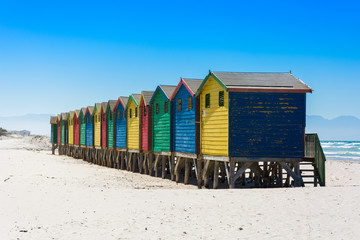 Naklejka premium Colourful beach huts at Muizenberg, Cape Town