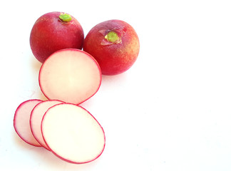 Fresh radishes on white