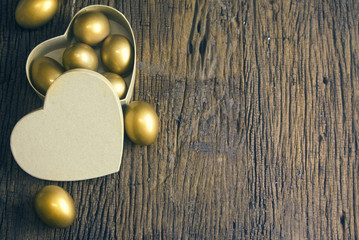 golden eggs with heart box love