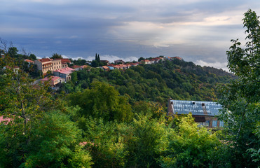 Fototapeta premium View of houses and old church in Signagi or Sighnaghi city. Georgia