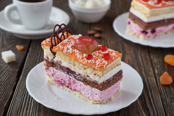 Delicious cake dessert with cream and fruit