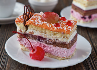 Delicious cake dessert with cream and fruit