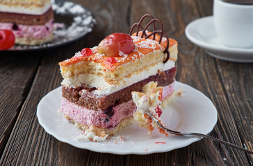 Delicious cake dessert with cream and fruit