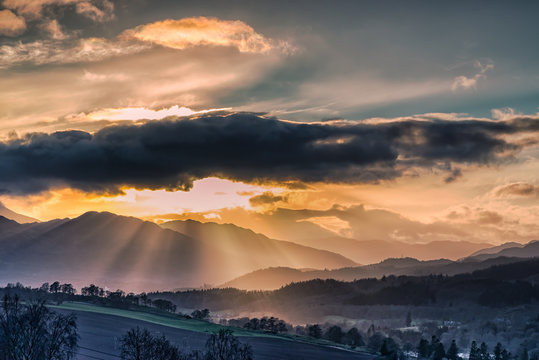 Stunning Scottish Hillside at Crieff  at Sun set on a misty winter evening .