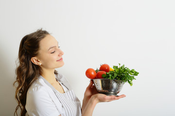 Girl and fresh vegetables