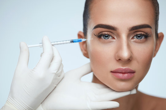 Beauty Care. Woman's Face Receiving Skin Lifting Injections