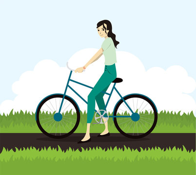 Active young woman riding on bicycle