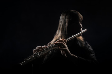 Flute player Flutist playing instrument flute music - obrazy, fototapety, plakaty
