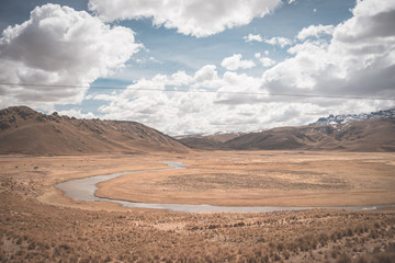 Fototapeta na wymiar High altitude Andean landscape with dramatic sky