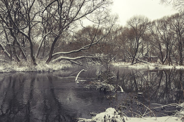 Winter landscape with flowing river