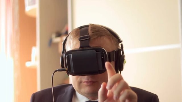 Businessman relax in VR headset in home