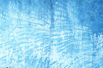 Wall fragment with scratches and cracks