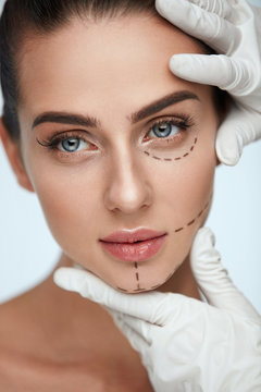 Young Female With Surgical Lines, Smooth Skin And Perfect Makeup