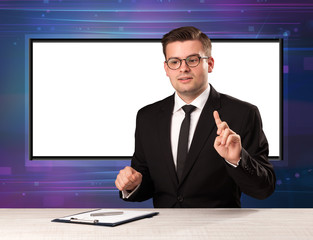 Television program host with big copy screen in his back