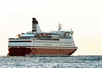 Obraz premium Red cruise liner's stern. Passenger ferry sailing from Riga to S