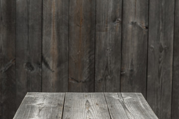 empty wooden table with wooden wall