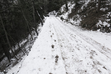 Mountain trail path in a snowy landscape