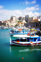 Fototapeta na wymiar Heraklion old port with colorful boats, at sunny day, Crete, Greece, retro toned