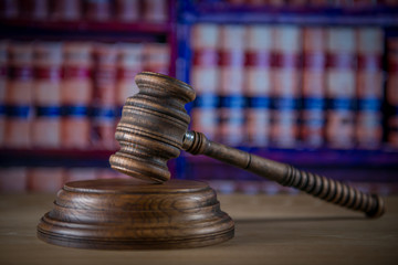Law concept Gavel and Lady of Justice on wooden table,  united kingdom flag