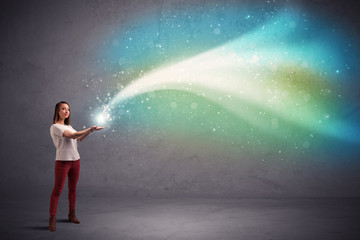 Fototapeta premium Woman holding light