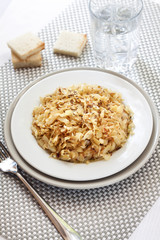 Fried cabbage with caraway and garlic on a plate