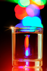 whisky glasses  with light bokeh