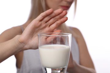Lactose intolerance. Dairy Intolerant Woman refuses to drink milk