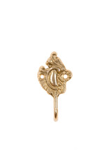 Vintage gold coat hook on white background