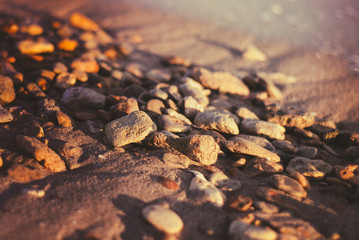 Stones by the sea in the sun. close-up