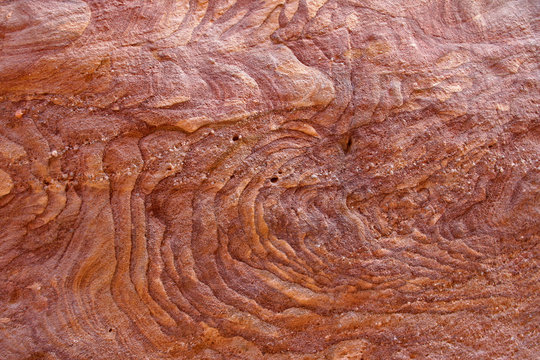 Fantastic patterns and traces of geological events on the walls colored canyon in Egypt.
