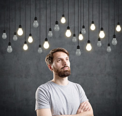 Bearded man and bulbs on wires