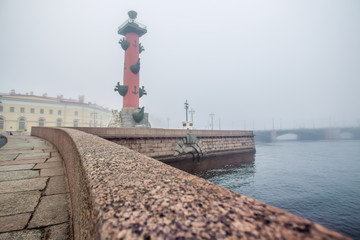 Rostral columns. Granite embankment of St. Petersburg.