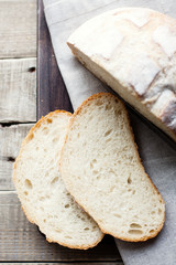 Sliced unleavened bread on a wooden table