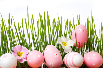 Easter eggs and wheat with flowers