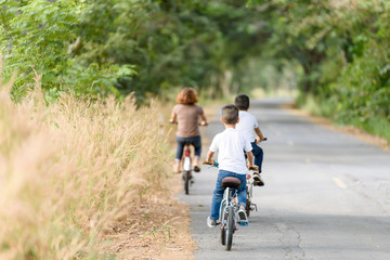 Obraz premium Boy ride bicycle