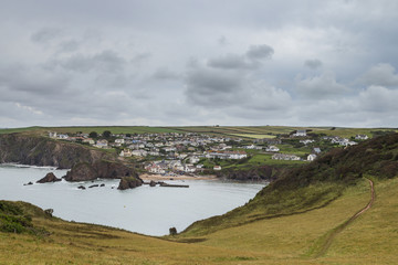 Panoramic view from Bolt Tail towards Hope Cove and South West Coast Path, Devon, England, UK