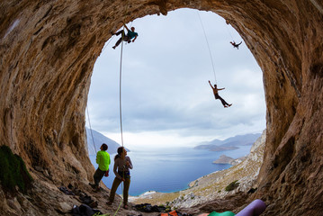 Rock climbers in cave