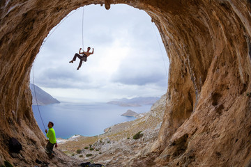 Rock climbers in cave