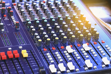 Mixer level control knob in the control room and sound recorder.