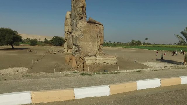 LUXOR, EGYPT - FEBRUARY 10, 2016: Pharaoh Amenhotep III's Sitting Colossi of Memnon statues at Luxor, West Bank 