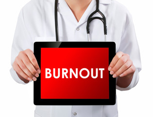 Doctor showing digital tablet screen.Burnout