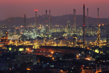 Beautiful scenery during time the twilight view from top of oil refinery industry. Oil refinery industry at Chonburi province in Thailand. Landscape of industry estate in Thailand. Industry concept