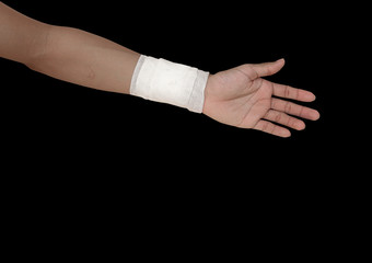 gauze bandage  patient with hand  wrap  injury   isolated on black background and clipping path