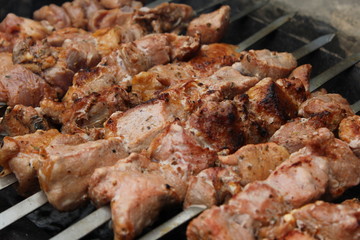 Meat porkis fried on the grill skewers at coals 20449