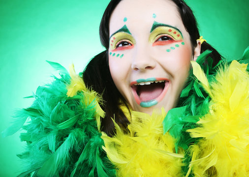 funny girl over green background