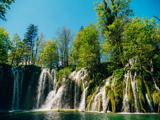 Waterfall in the national park Plitvice Lakes, Croatia. Waterfall in the forest.