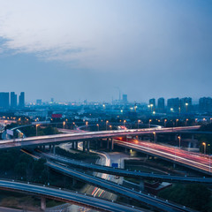 Naklejka premium urban traffic with cityscape in city of China.